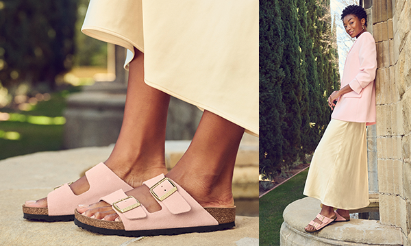 Woman in midi skirt wearing light pink Birkenstock Arizona sandals