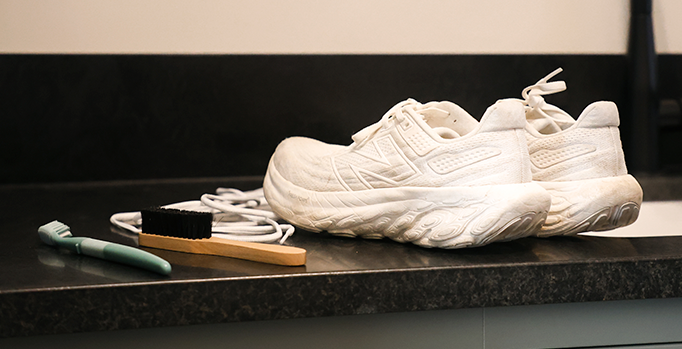 A pair of shoes being cleaned