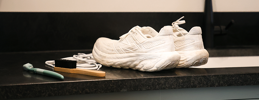 A pair of shoes being cleaned
