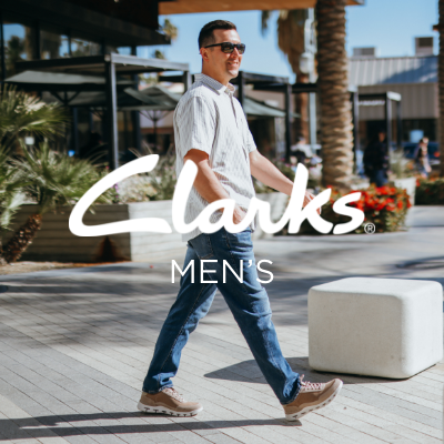 Man walking outside of shopping mall