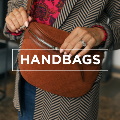Woman holding onto Hobo handbag