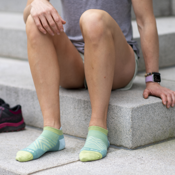 Women sitting on stairs stretching