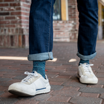 Man walking down sidewalk