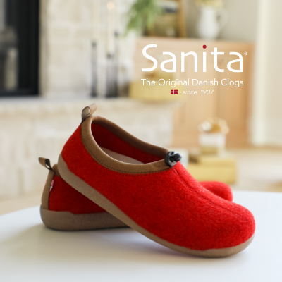 Sanita Samso slipper posed on ottoman