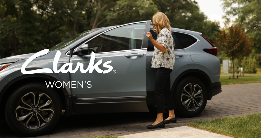 Woman getting into car