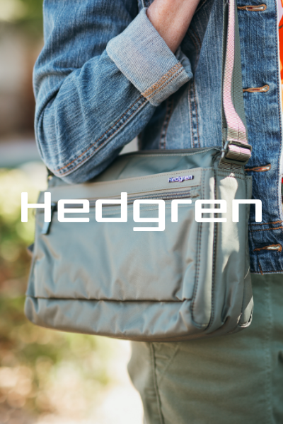 Woman holding bag on shoulder