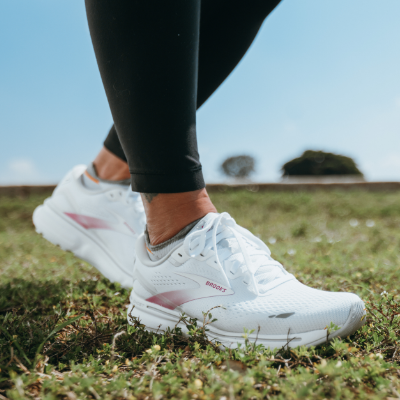 Woman standing in grass