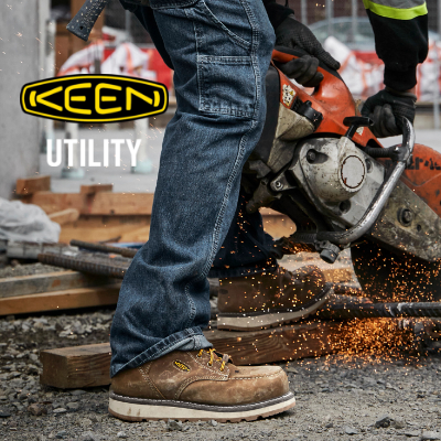 Man using chainsaw at job site wearing Keen Utility Cincinnati 6" Soft Toe Boots