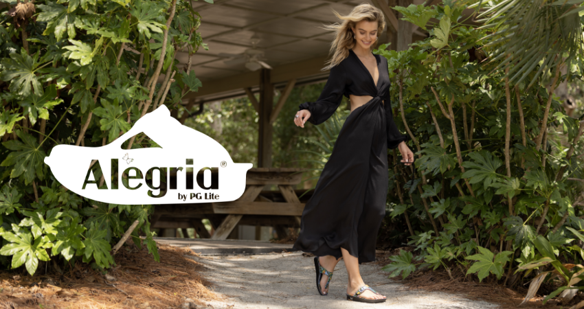 Woman walking on shaded pathway