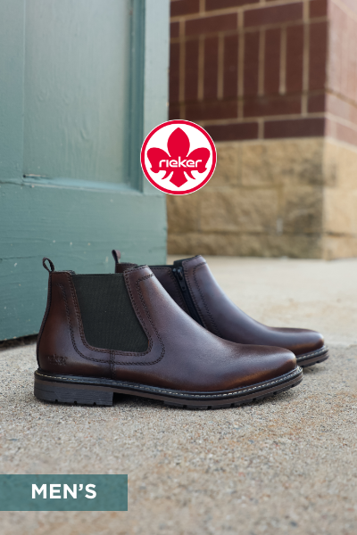 Rieker boots sitting on sidewalk