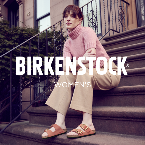 Woman sitting on stairsteps