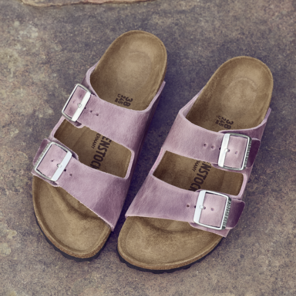 Shoes sitting on sidewalk