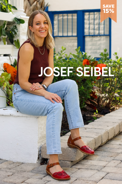 Woman sitting on stairs wearing Josef Seibel sandals