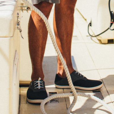Man standing on boat working