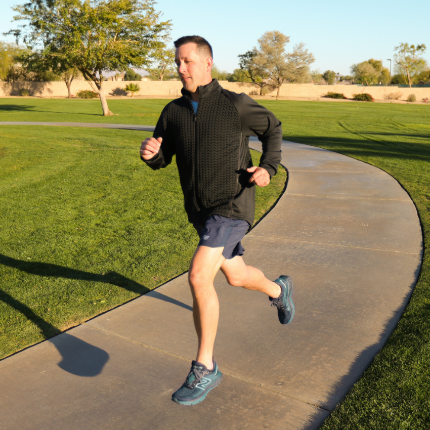 Man running through park 