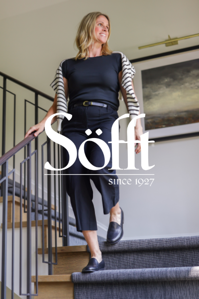 Woman walking down stairs