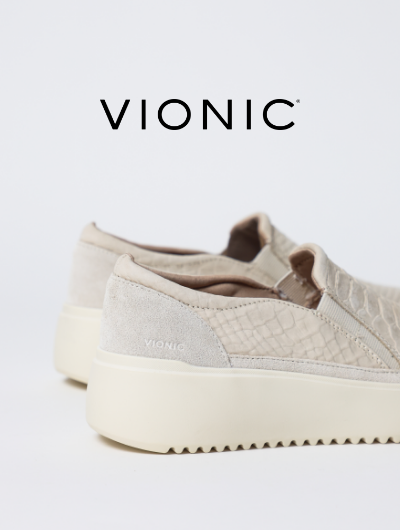 Vionic shoes sitting on white backdrop