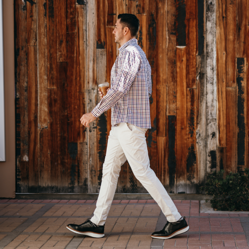 Man walking on sidewalk