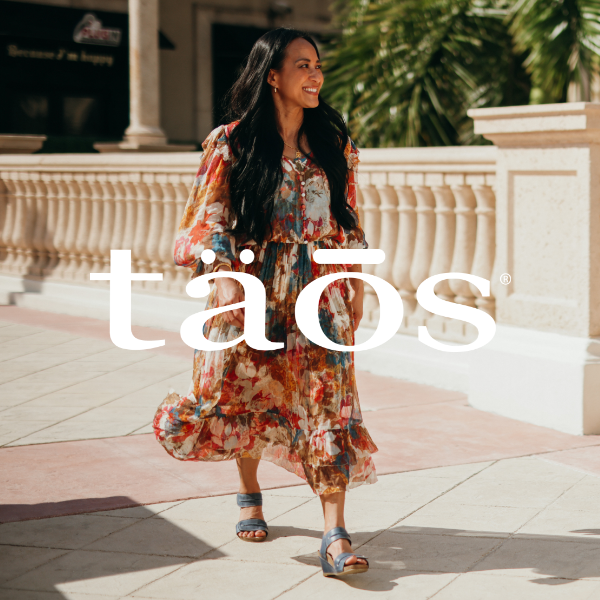 Woman walking in shopping plaza