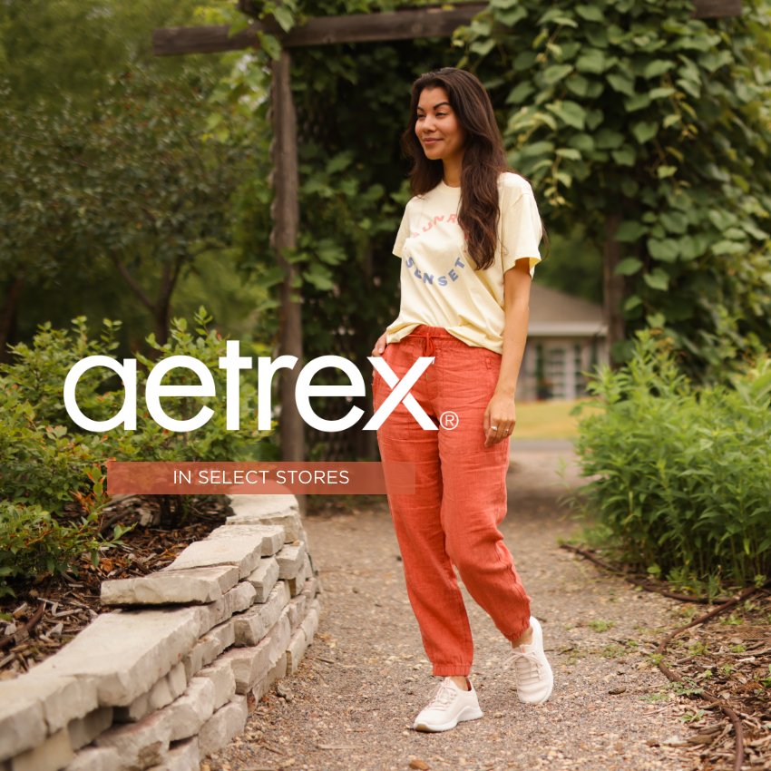 Woman walking through park