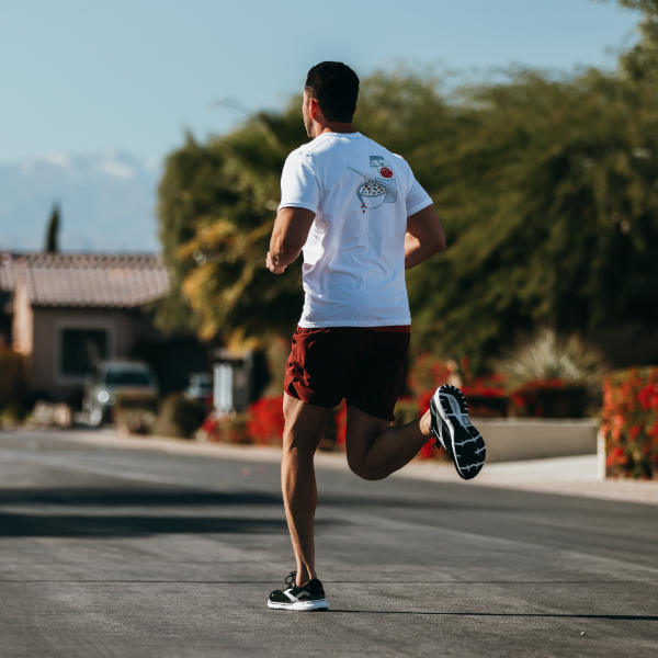 Man running down street
