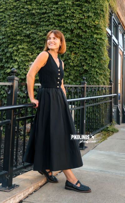 Woman leaning against railing