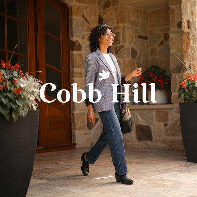 Woman walking out of front door