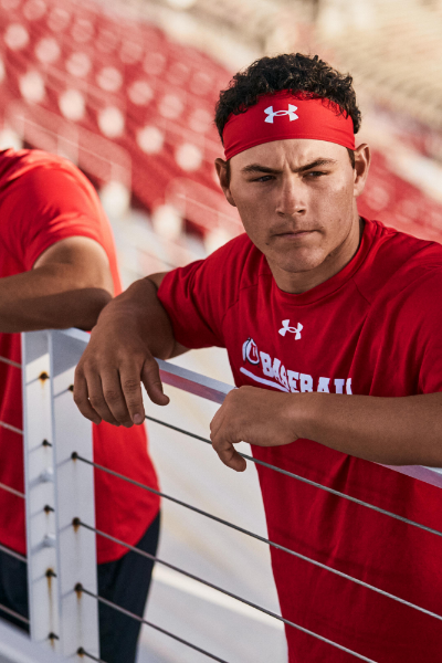 Man resting on railing after workout