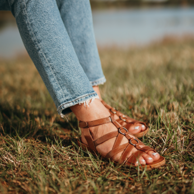 Woman resting feet in grass