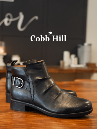 Cobb Hill Nessa boots sitting on countertop