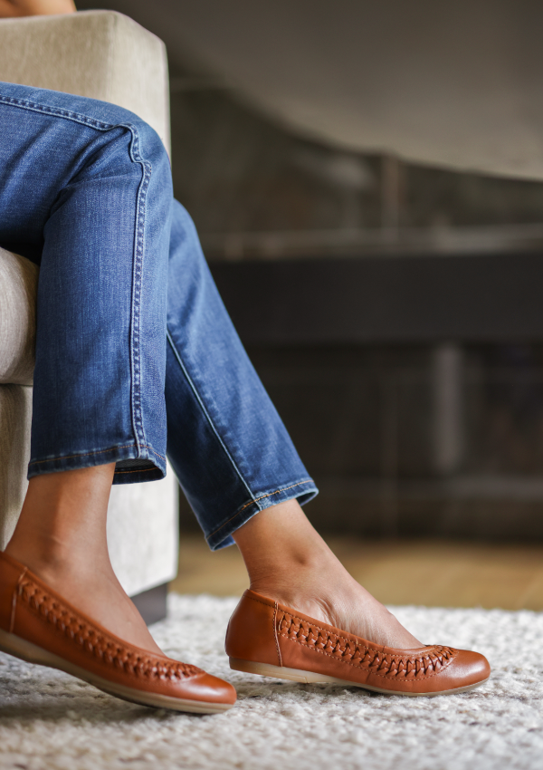 Woman sitting on couch