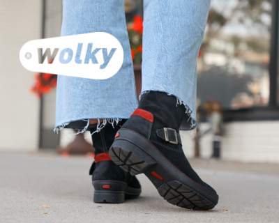 Woman posing feet on sidewalk in Wolky Nitra boots