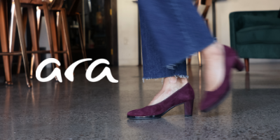Woman walking in bar in Ara Ophelia heels