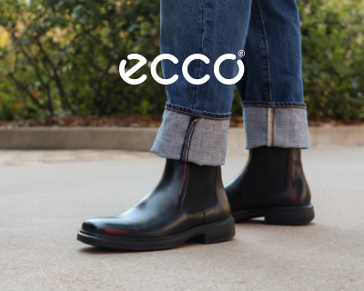 Man standing on sidewalk in Ecco Helsinki 2.0 Chelsea boots