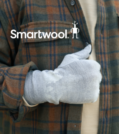 Man wearing Smartwool gloves