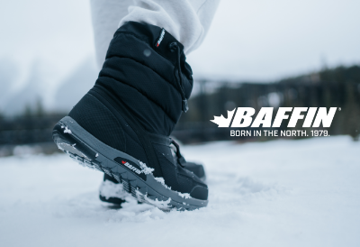Man standing in snow wearing Baffin winter boots
