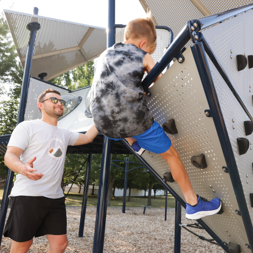 Kid playing on playground