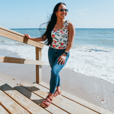 Woman standing on boardwalk