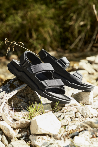 Shoes sitting on rock