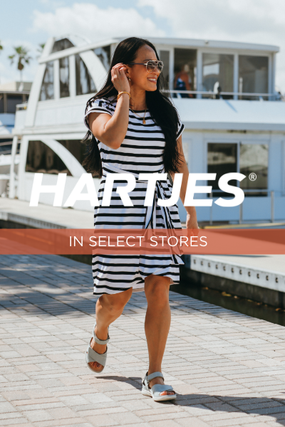 Woman walking on board walk