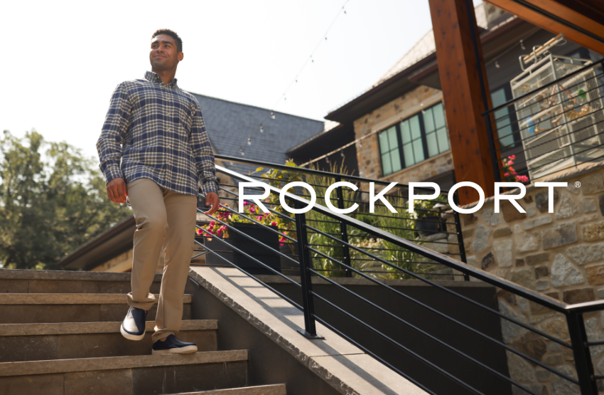 Man walking down stairs in backyard