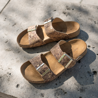 Shoes sitting on sidewalk