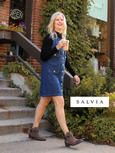 Woman walking out of store in Salvia Noa boots