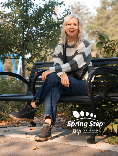 Woman sitting on bench wearing Spring Step Cleora boots