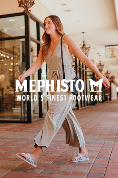 Woman walking through shopping plaza