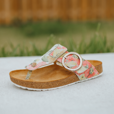 Shoe sitting on sidewalk