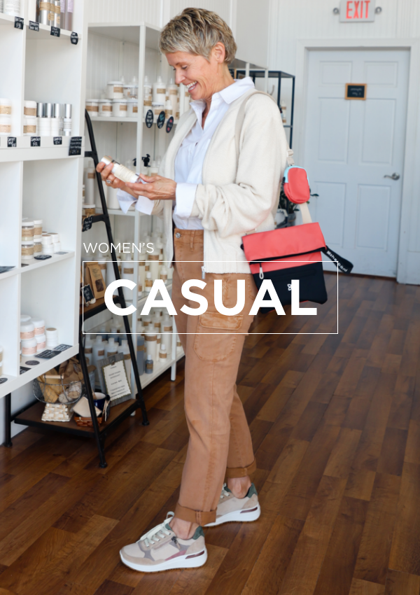 Woman browsing Modern Roots store in Ara sneakers 