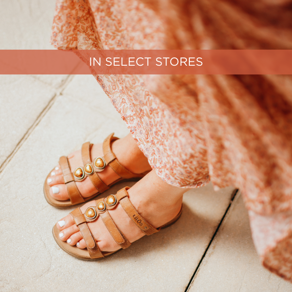 Woman posing in shopping plaza