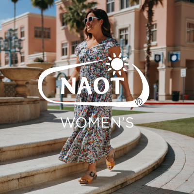 Woman walking on stairs in shopping plaza