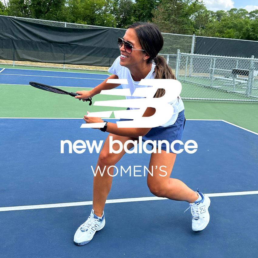 Woman hitting ball on pickleball court